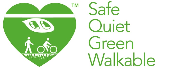 Green, Quiet, Safe, Walkable, and Car-Free logo for Transit X.  Green Heart showing person walking, biking, grass, and riding a pod.